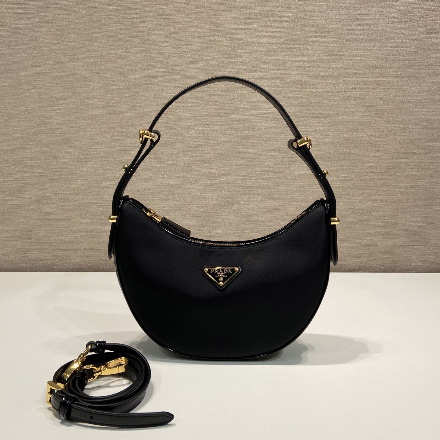 Pra*a top handle bags